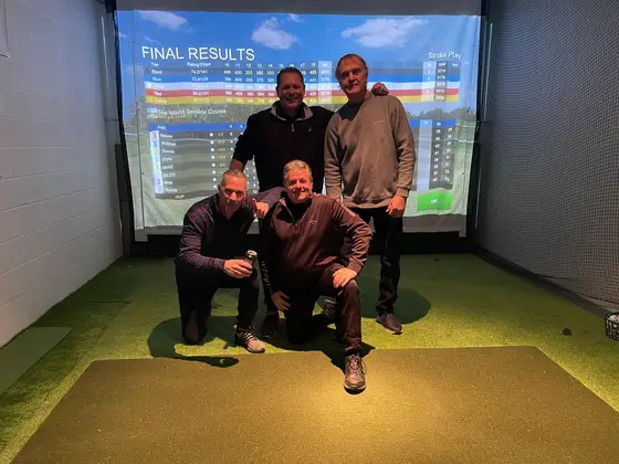 Four new shoot-out champions posing in front of the final results screen